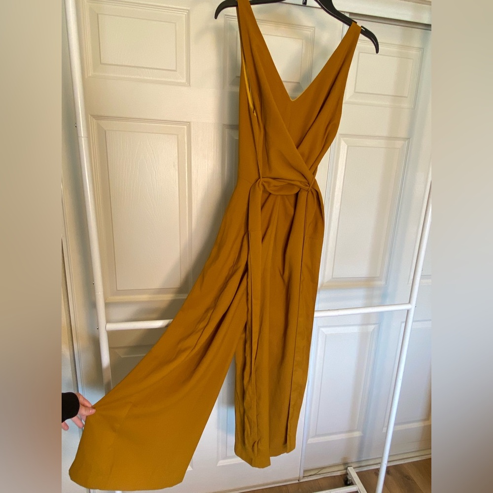 FAVLUX Yellow Jumpsuit 
Size: S (4-6)